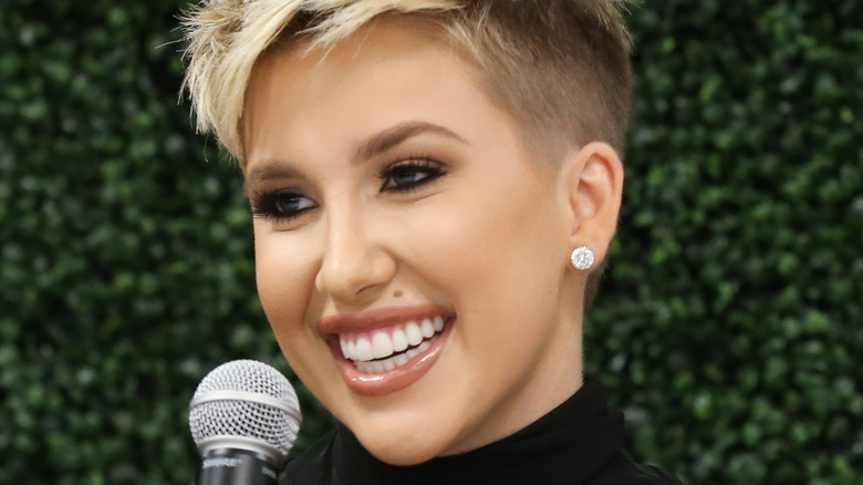 Savannah Chrisley holding microphone