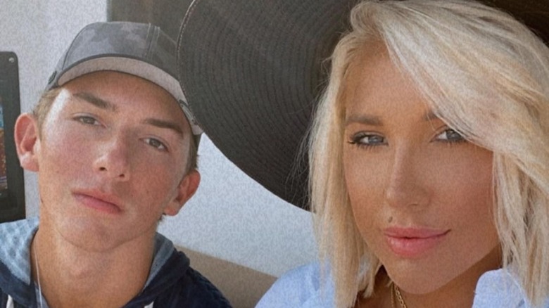 Grayson Chrisley Savannah Chrisley posing