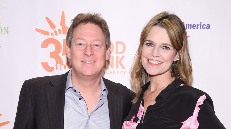 Savannah Guthrie and Michael Feldman pose