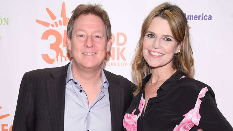 Savannah Guthrie and Michael Feldman pose