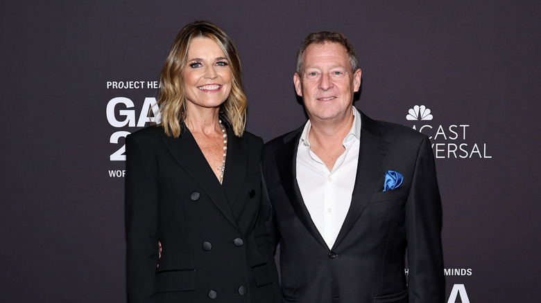 Savannah Guthrie and Michael Feldman wearing all black at a red carpet event
