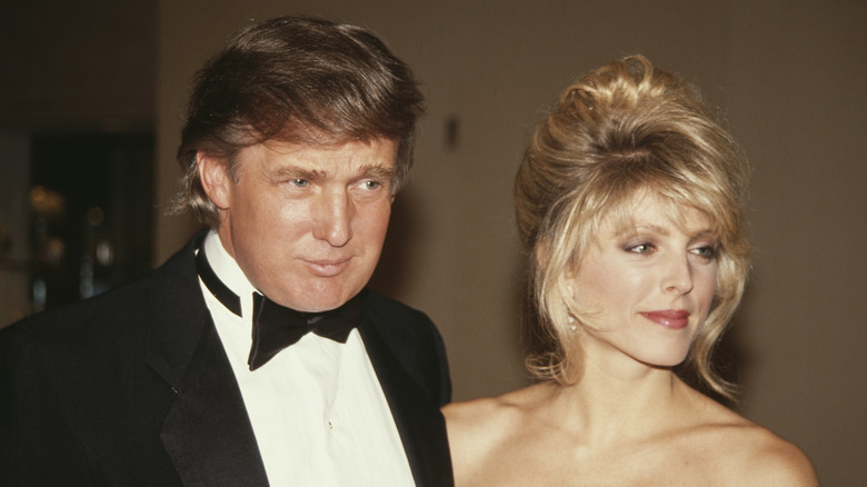 Donald Trump poses next to Marla Maples