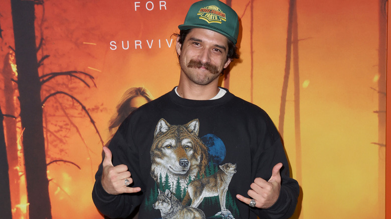 Tyler Posey smirking