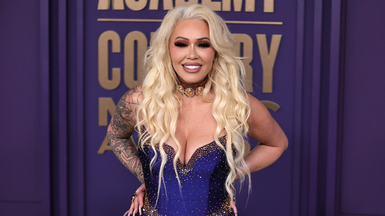 Bunnie Xo in a blue dress