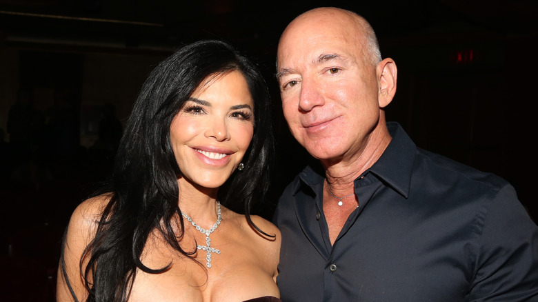 Lauren Sanchez and Jeff Bezos photographed in front of a black background