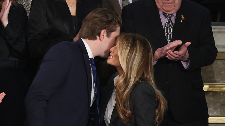 Barron Trump kissing his mother, first lady Melania Trump at the State of the Union address during a Joint Session of Congress at the U.S. Capitol