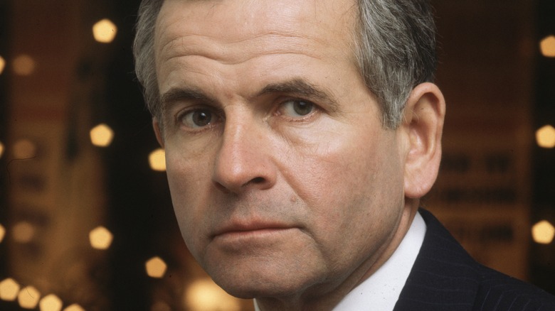 Ian Holm looking serious