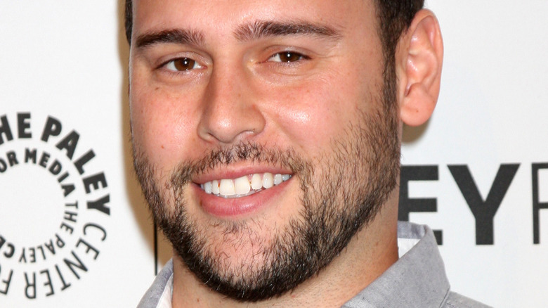 Scooter Braun smiles at an event
