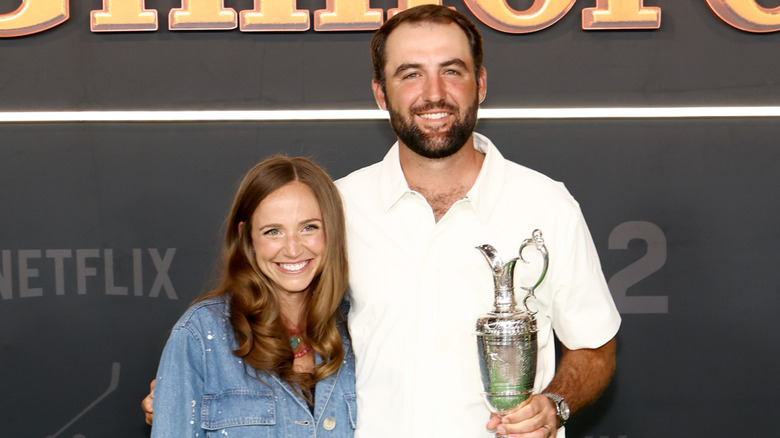 Scottie and Meredith Scheffler posing at the Happy Gilmore 2 premiere.