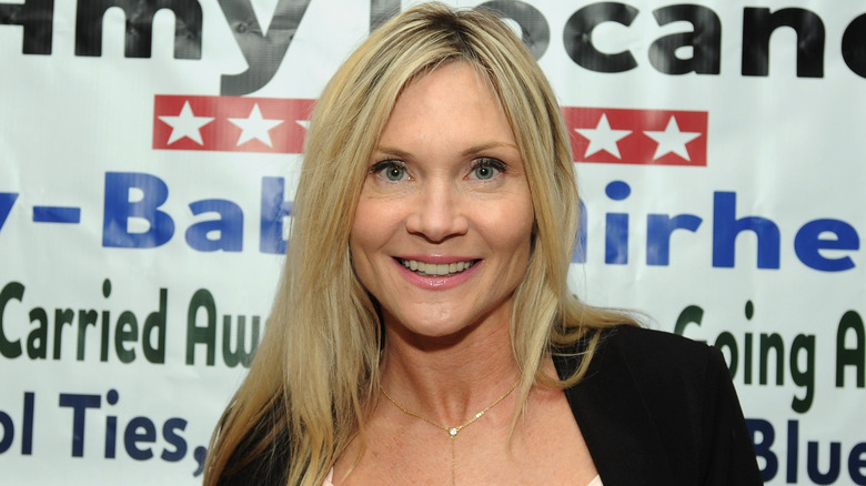 Amy Locane smiling