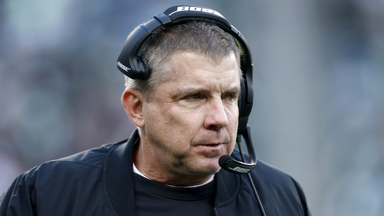 Sean Payton wearing a headset