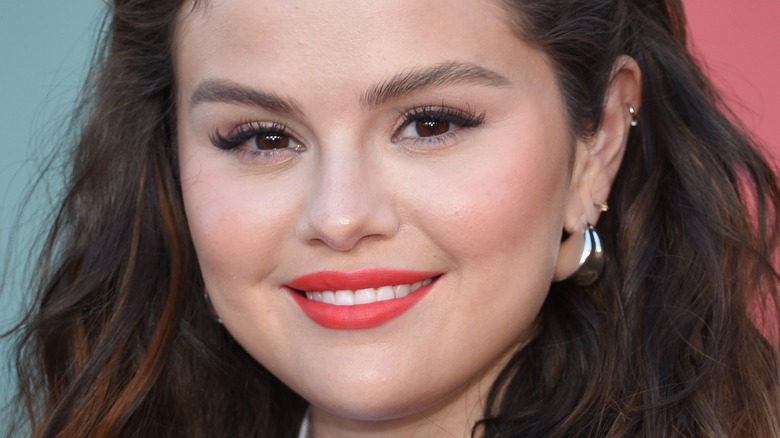 Selena Gomez wearing red lipstick