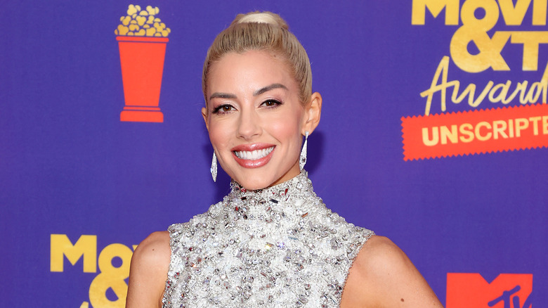 Heather Rae El Moussa posing on the red carpet