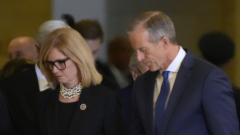 Kimberley Thune and U.S. Sen. Majority Leader John Thune (R-SD) entering Emancipation Hall during a review of troops for the Inauguration of Donald J. Trump at the U.S. Capitol