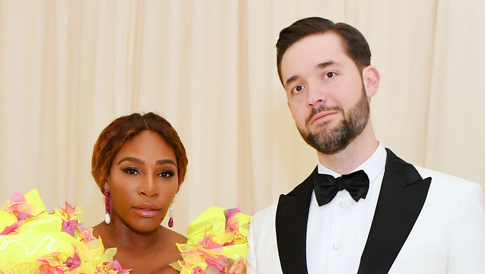 Serena Williams and Alexis Ohanian Sr. looking serious