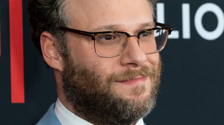 Seth Rogen smiling red carpet glasses