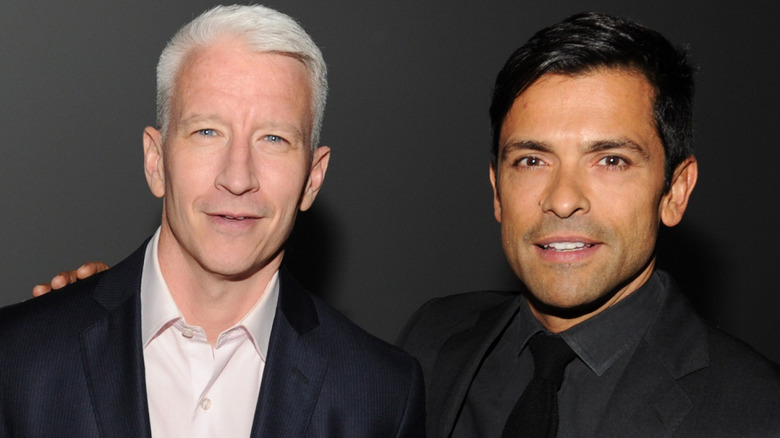 Anderson Cooper and Mark Consuelos posing for cameras