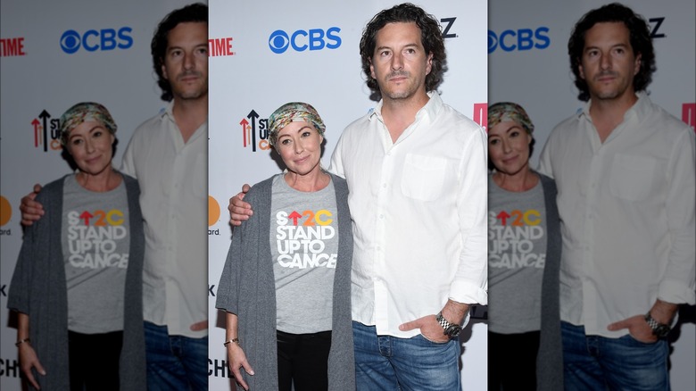 Kurt Iswarienko with arm around Shannen Doherty