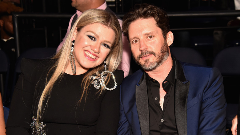 Kelly Clarkson and Brandon Blackstock pose together in 2018