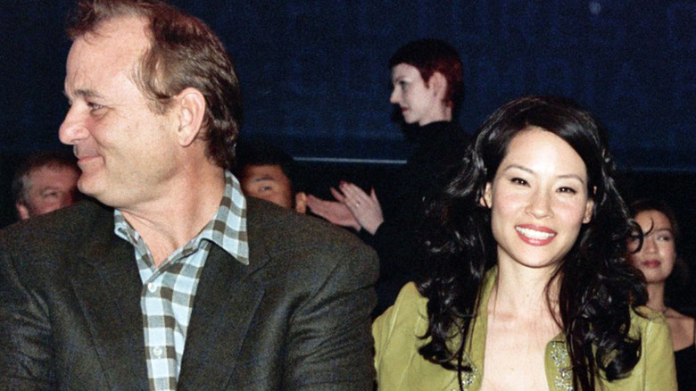 Bill Murray and Lucy Liu smiling at event