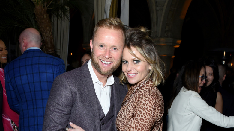 Valeri Bure and Candace Cameron Bure smiling together