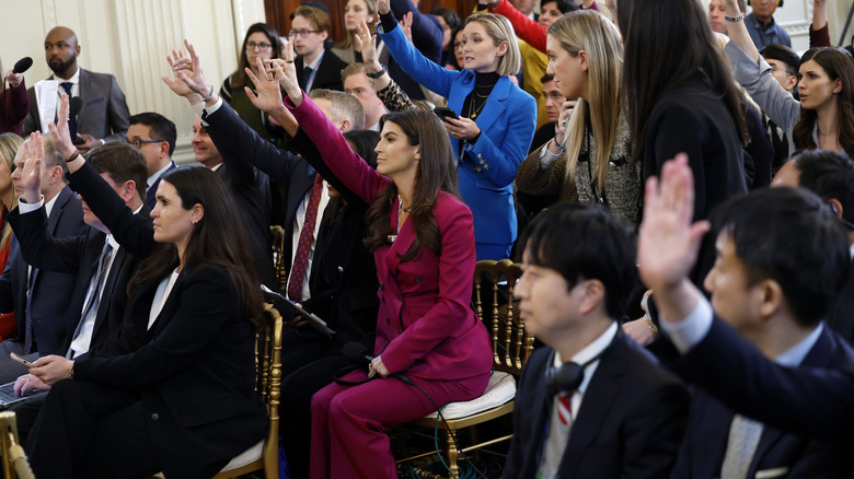 Kaitlan Collins at a press conference at the White House