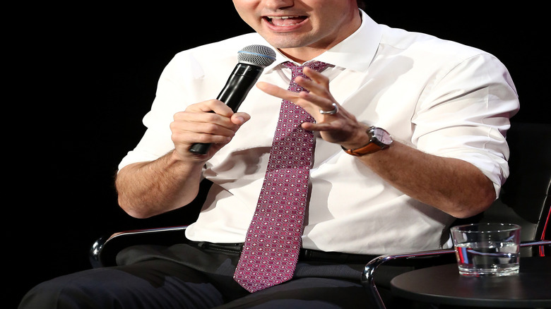 Justin Trudeau holding a mic