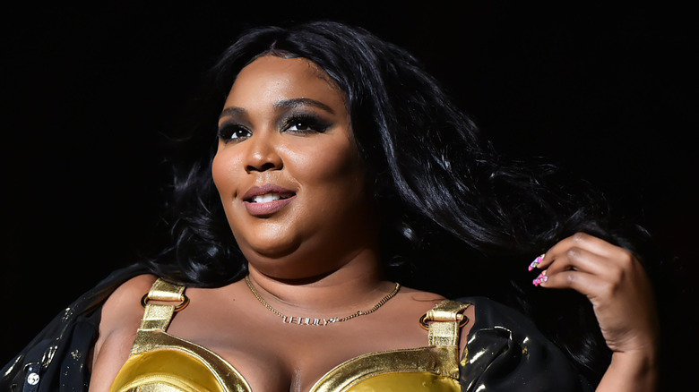 Lizzo performing onstage