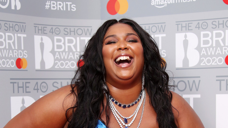Lizzo poses for a photo