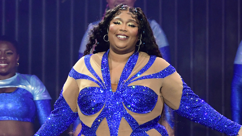 Lizzo performing onstage