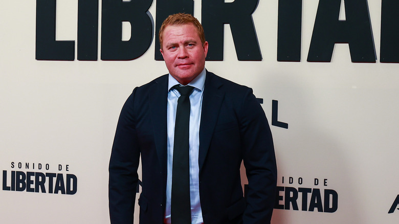 Tim Ballard in a black suit