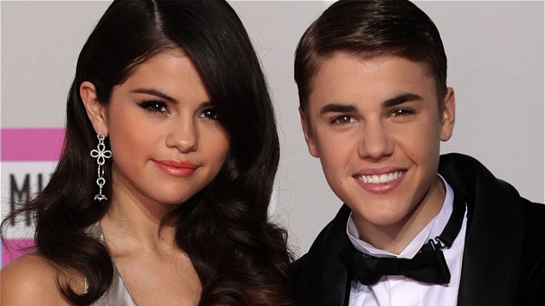 Selena Gomez and Justin Bieber, both smiling