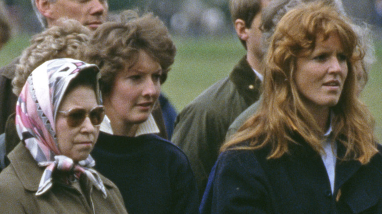 Sarah Ferguson, Queen Elizabeth II, and others watching horse show in 1987