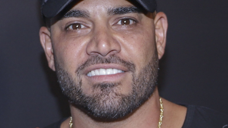 Mike Shouhed of Shahs of Sunset smiling and wearing baseball cap