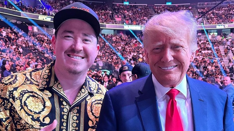 Shane Gillis and Donald Trump smiling in crowd