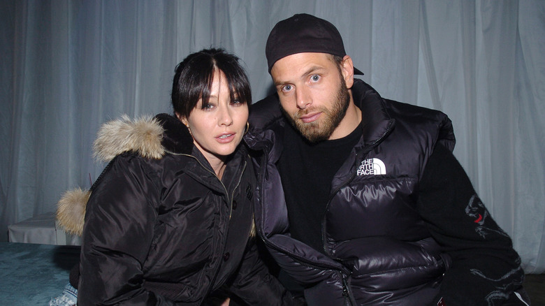 Shannen Doherty and Rick Salomon posing