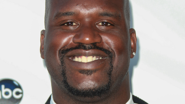 Shaq smiling at an event