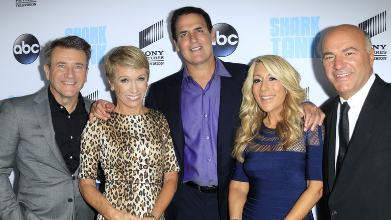 Cast members of Shark Tank at an event 