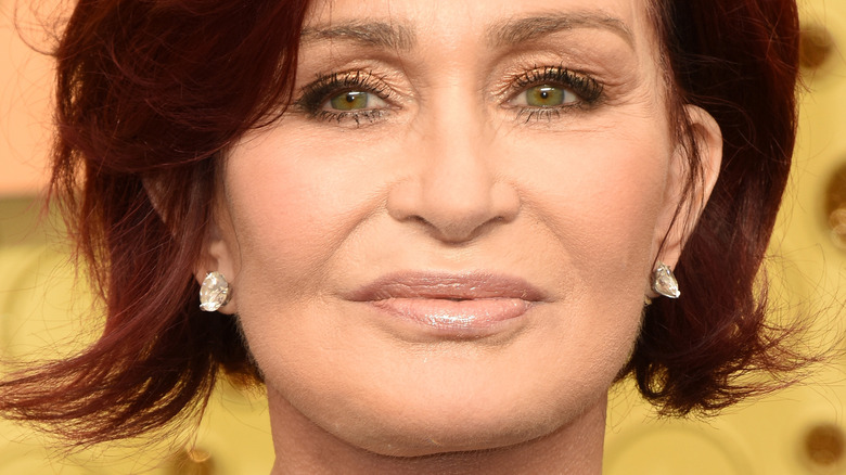 Sharon Osbourne smiling on the red carpet