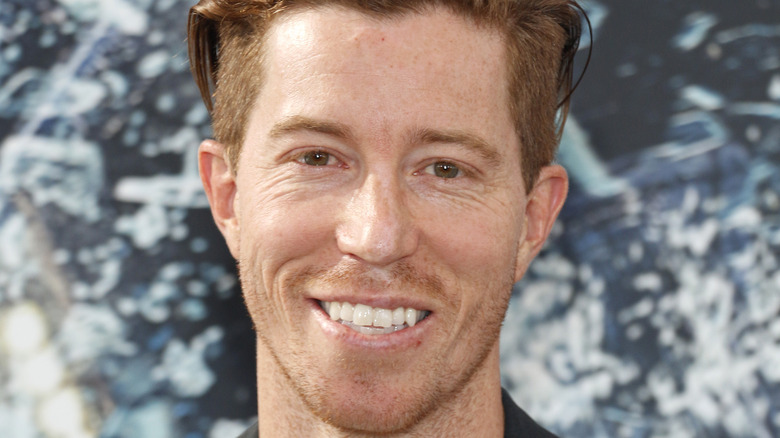 Shaun White smiles at an event