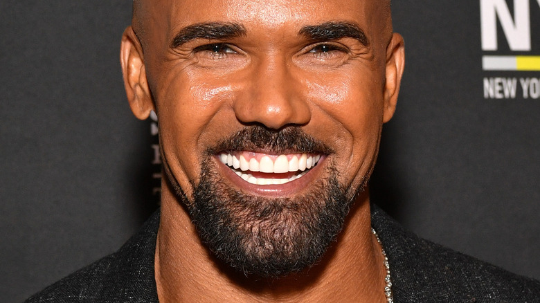 Shemar Moore smiling with beard 
