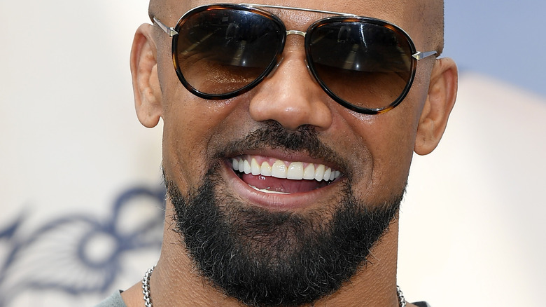 Shemar Moore smiling with sunglasses