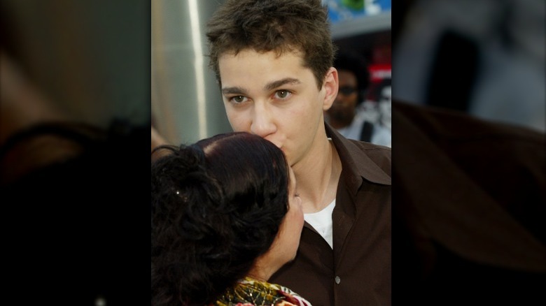 Shia LaBeouf kisses the forehead of his mother, Shayna Saide