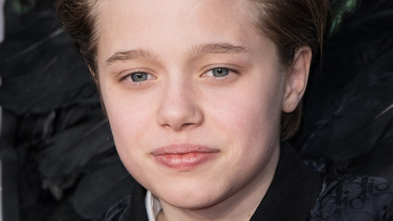 Shiloh Jolie-Pitt posing