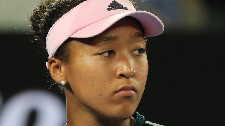 Naomi Osaka playing tennis