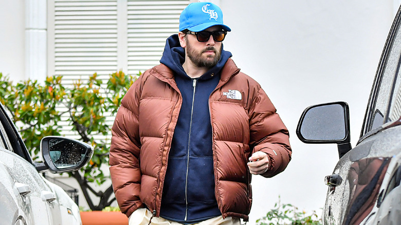 Scott Disick is seen walking to his car in March 2023