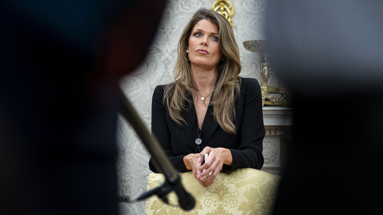 Lindsey Halligan sitting in a chair