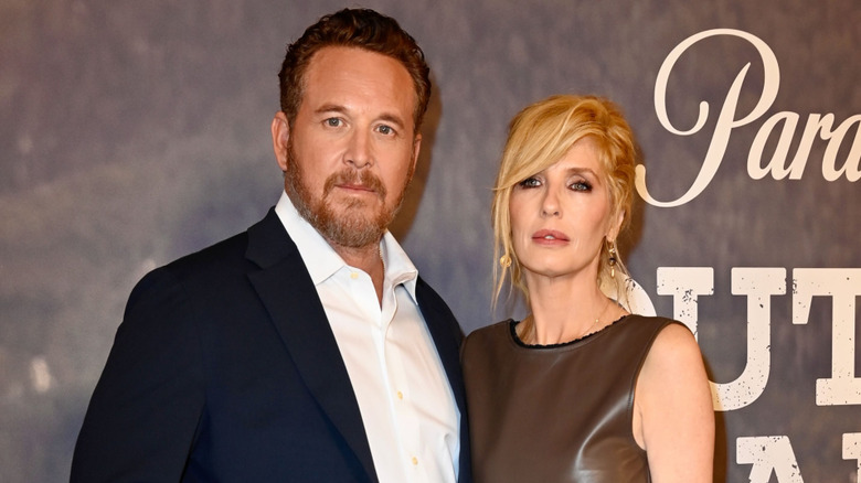 Cole Hauser and Kelly Reilly posing.