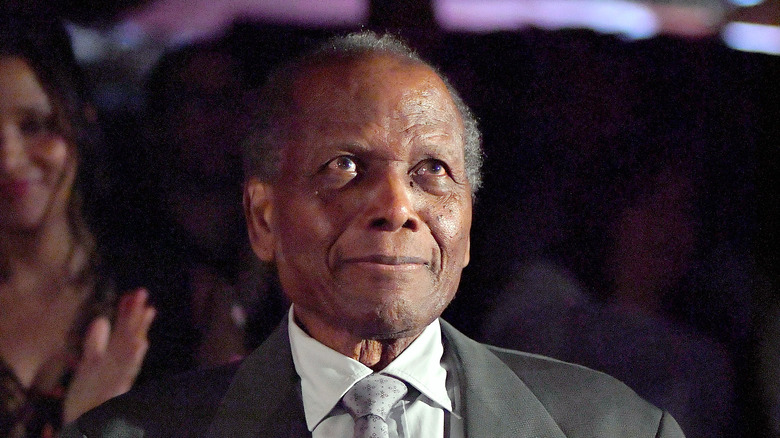 Sidney Poitier smiling and looking up in 2017