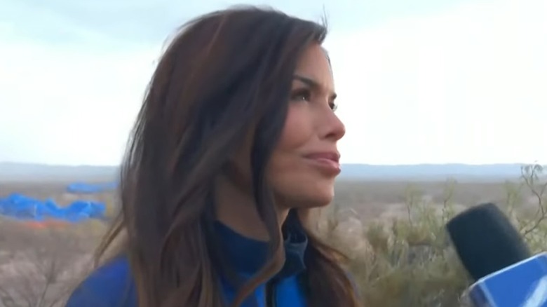An emotional Lauren Sánchez stares at a reporter during her post-flight interview.